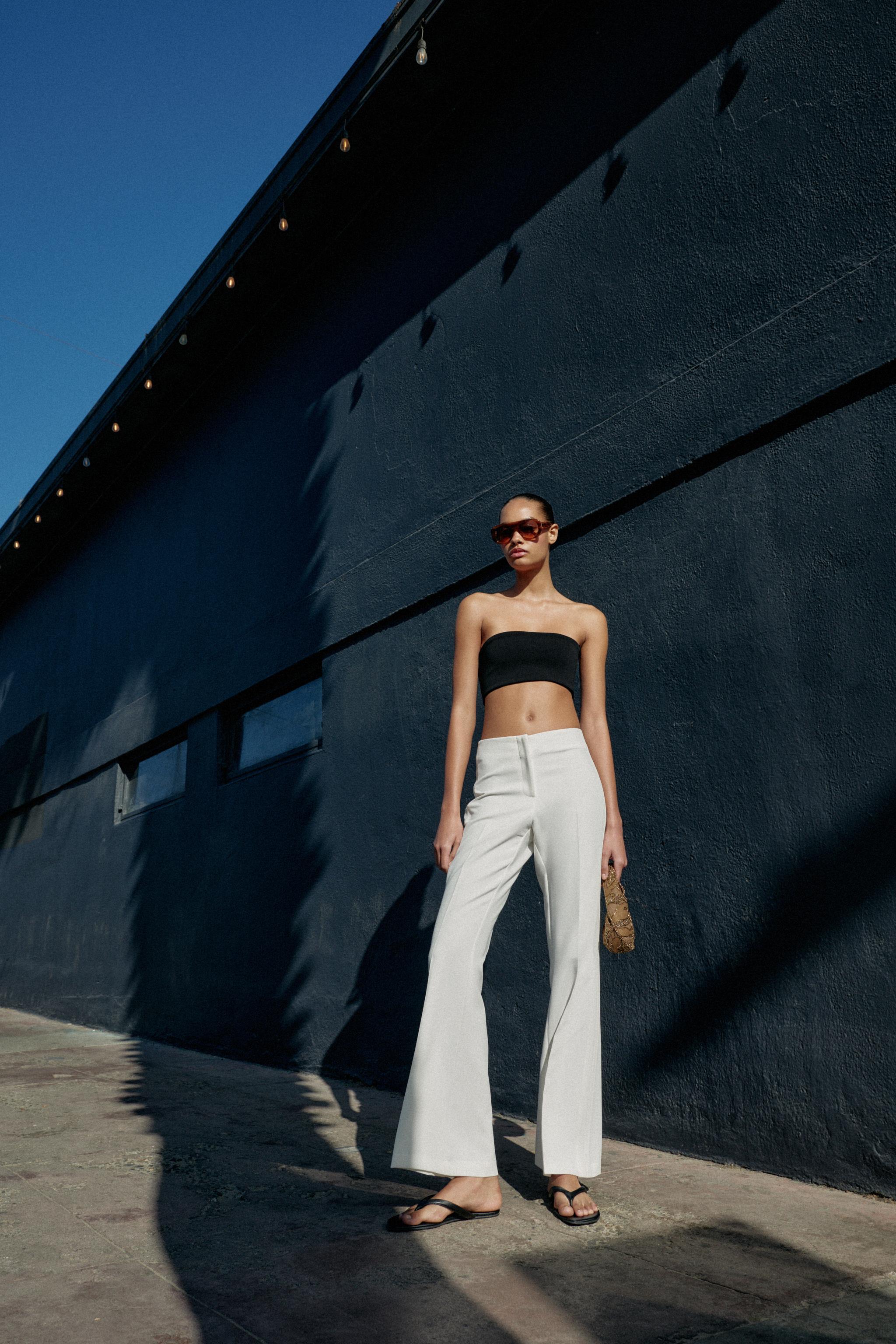 PANTALON FLARE À COUTURES LATÉRALES